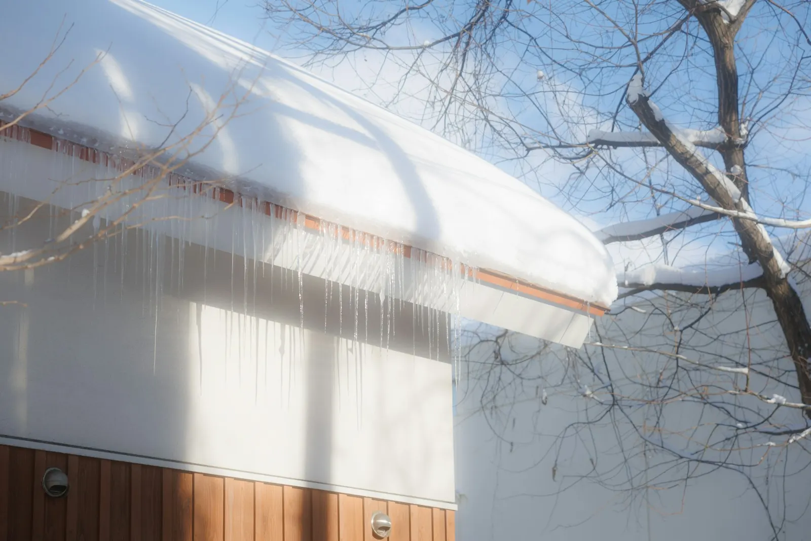 Icicles on a snow-covered roof